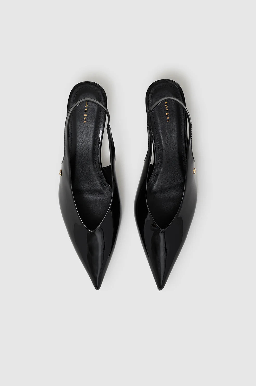 Hilda Slingback Pumps in Black Patent