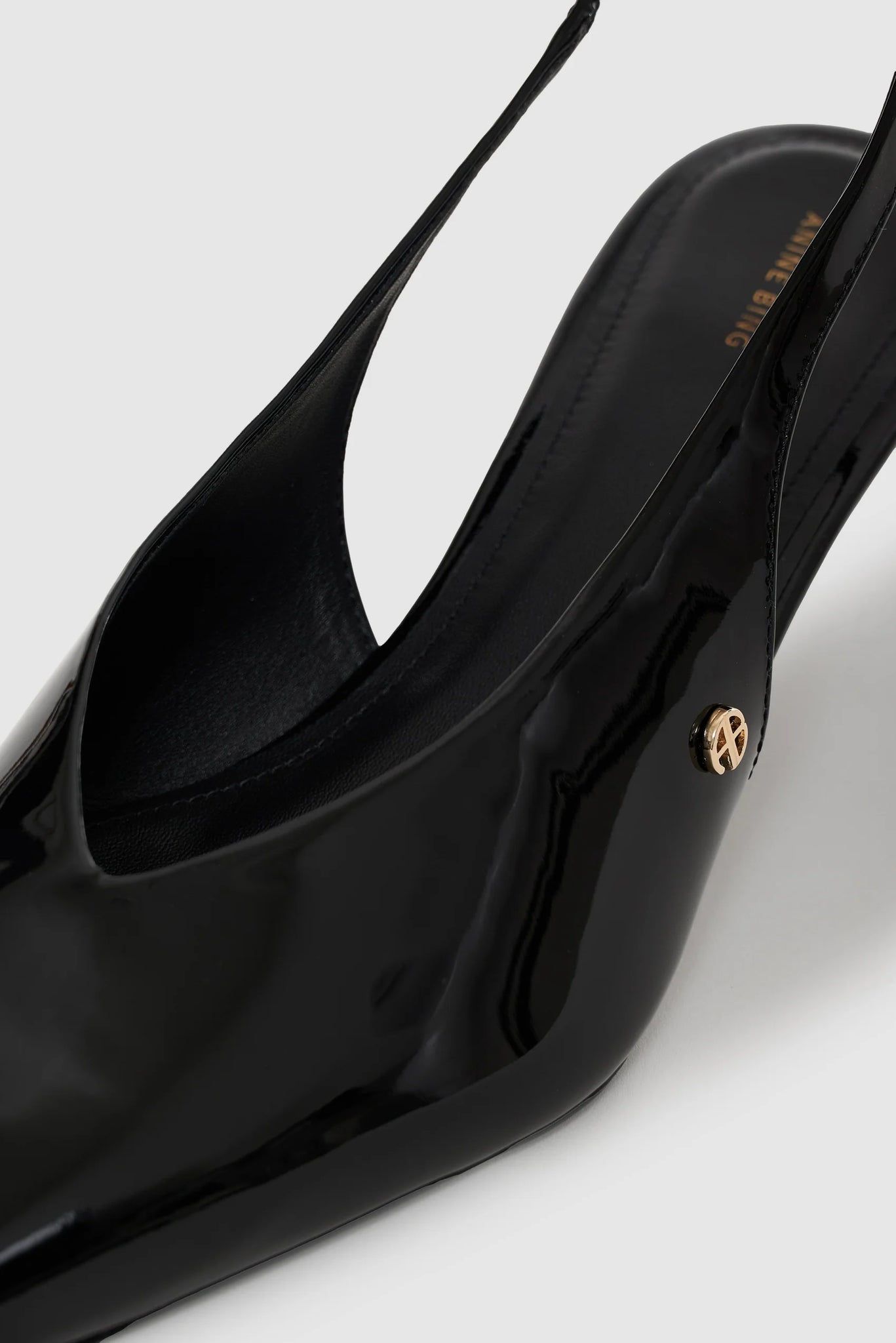 Hilda Slingback Pumps in Black Patent