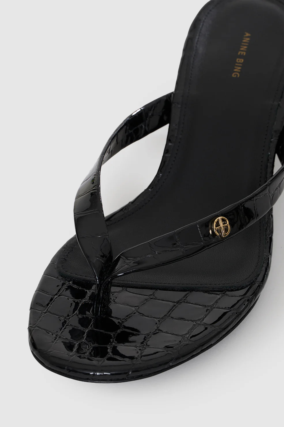 Noelle Thong Heels in Embossed Black