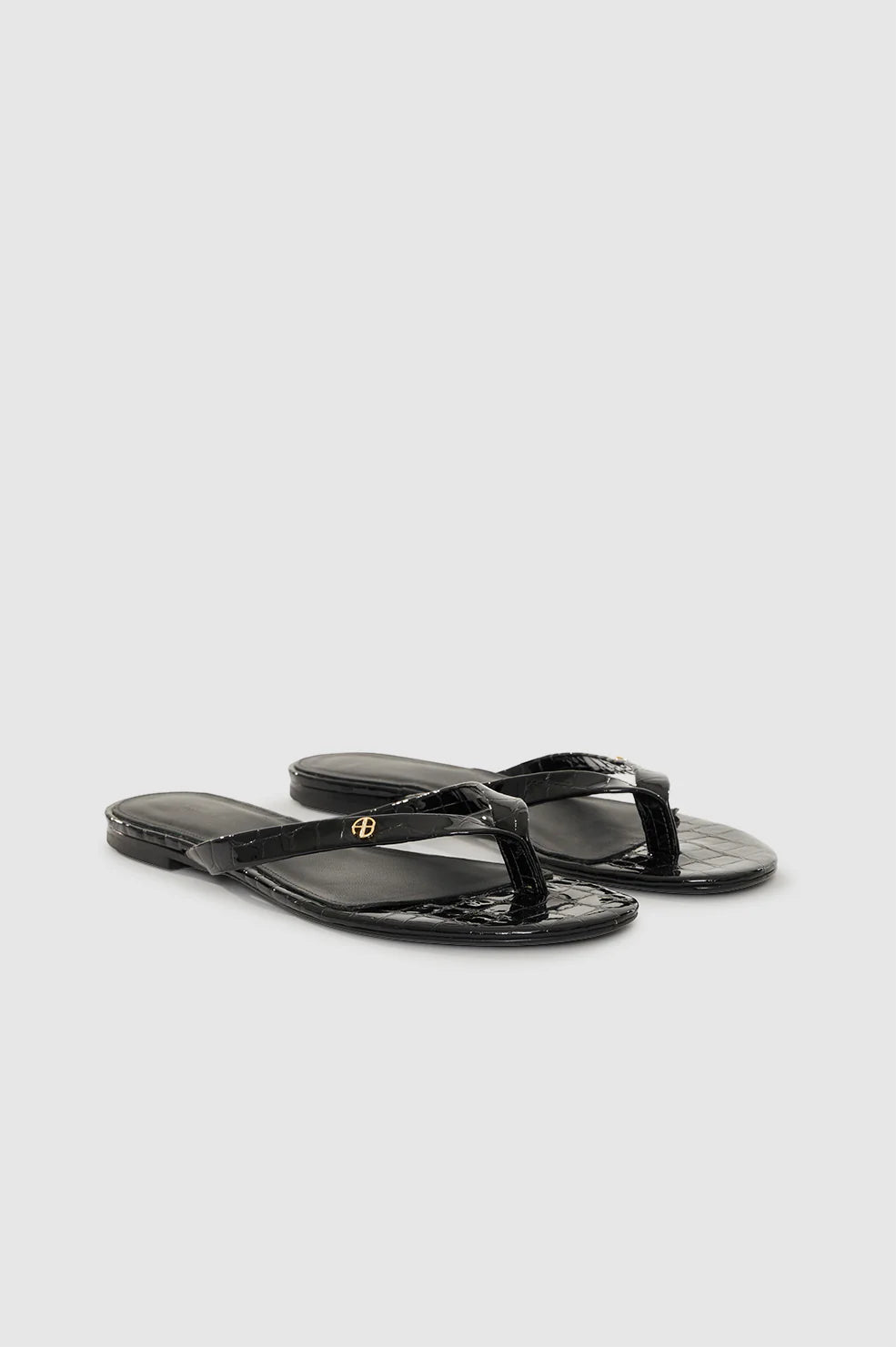 Noelle Thong Sandals in Embossed Black