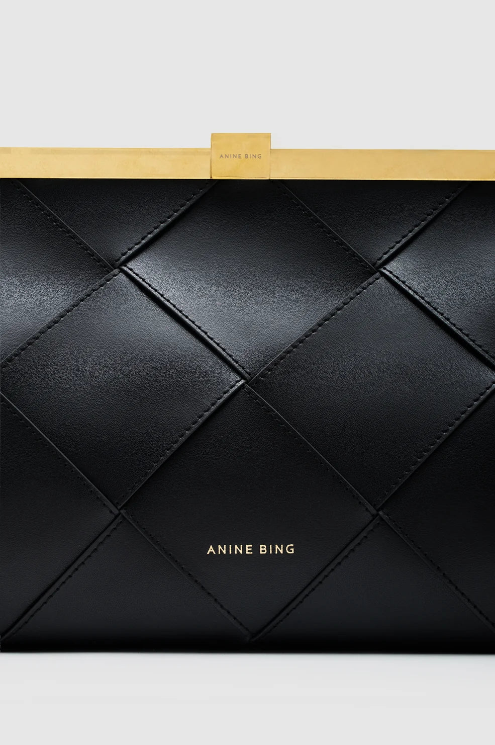 Anine Clutch Braided Leather in Black
