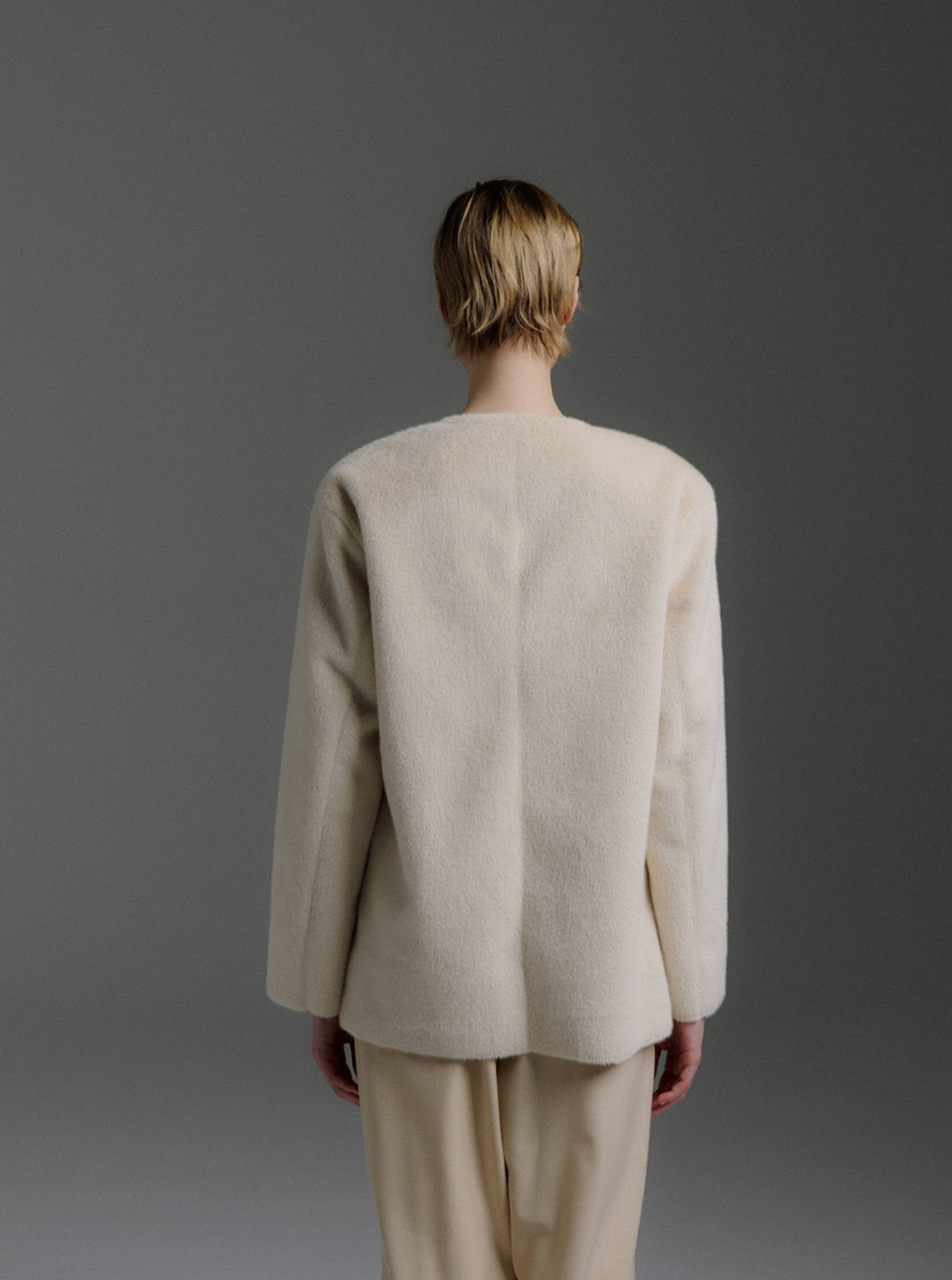 Donna Lightweight Collarless Faux Fur Jacket in Ivory