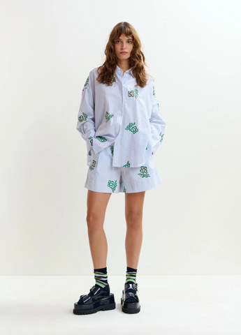 Juste Embroidered Mini Shorts in Light Blue Pinstipes and Embroidered Details