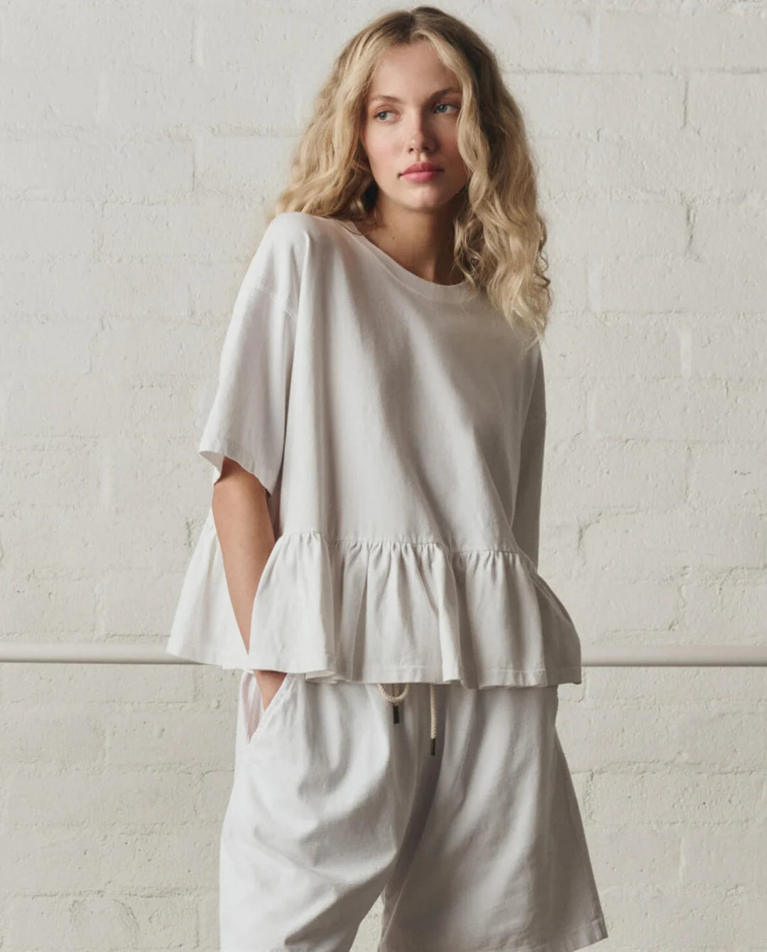 The Oversized Ruffle Peplum Tee. True White