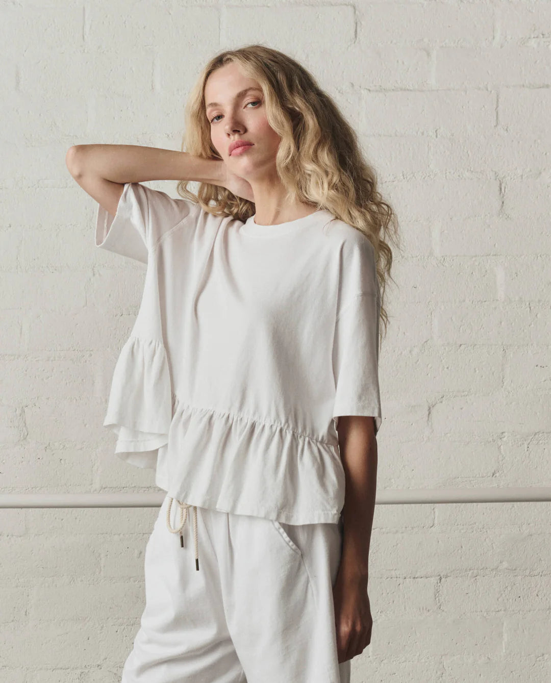 The Oversized Ruffle Peplum Tee. True White