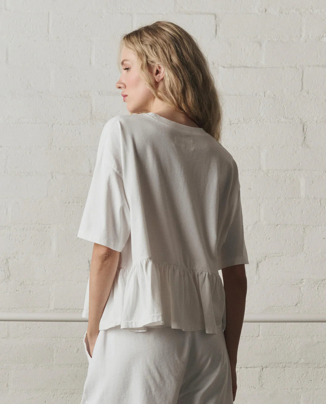 The Oversized Ruffle Peplum Tee. True White