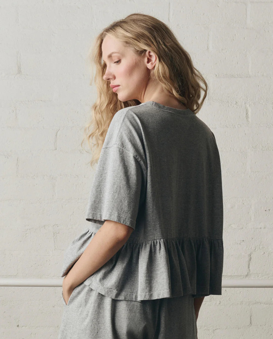The Oversized Ruffle Peplum Tee. Heather Grey