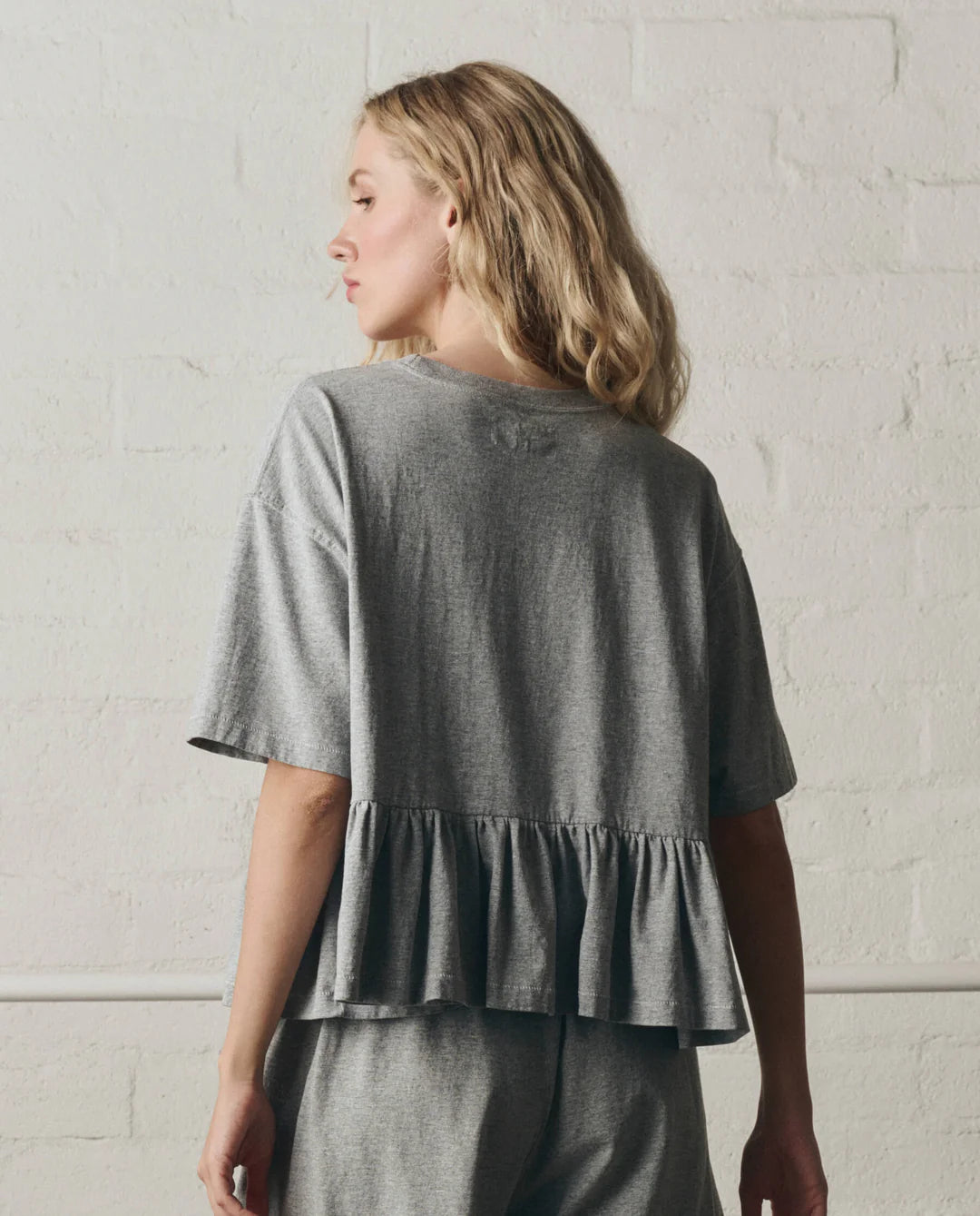 The Oversized Ruffle Peplum Tee. Heather Grey