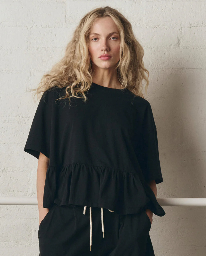 The Oversized Ruffle Peplum Tee. True Black